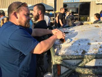 Dinner from the hood of the dirtiest Jeep at the 11th annual Jeep NIght at Newcastle CDJRV on June 14. SUZI THAYER/Boothbay Register