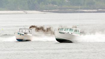 Cameron Crawford, in Wild Wild West, left, won the race for the fastest lobster boat of the day, and Tom Clemons, in Motivation, place second, in the Charlie Begin Memorial Lobster Boat Race on June 17. Courtesy of Michael Leonard