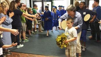 Seniors head into BRES for the second annual Senior Walk. SUZI THAYER/Boothbay Register
