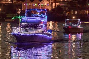 Nick Upham in Blown Budget, front, won the Best In Show award in the Windjammer Days Lighted Boat Parade. Courtesy of Michael Leonard