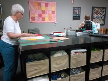 Volunteers from the Community Center’s Just Sew group make good use of the new fiber arts room and its furnishings. JANE CARPENTER/Boothbay Register