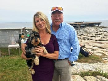 Innkeepers Heather and Mark Zinkiewicz with their long-haired, wire-haired, miniature, dappled dachshund, Piper. SUZI THAYER/Boothbay Register