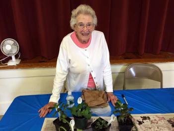 Jean Thompson sells plants at the fair July 19. SUZI THAYER/Boothbay Register