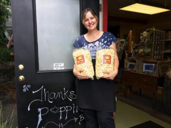 Jennifer Ingham stands in the doorway of her popcorn shop, Cameron Clan Kettle Corn in Wiscasset. SUZI THAYER/Boothbay Register