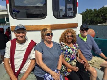 Jeff Swain, left, and Nancy Anderson, from North Carolina and Southport, take the cruise with Juanita and Mark Tischendorf from Rochester, New York. SUZI THAYER/Boothbay Register
