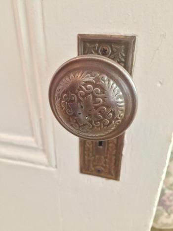A doorknob was scraped of layers of paint to reveal the beauty lying beneath. SUZI THAYER/Boothbay Register