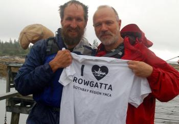 Shawn Griffith and Aurelia Recoing are unfazed by the rain. ART MAYERS/Boothbay Register