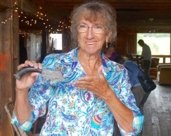 Elizabeth Ann Leach holds up a found treasure. ART MAYERS/Wiscasset Newspaper