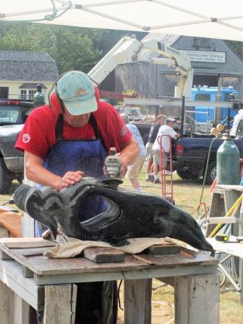 Dick Alden of East Boothbay and Starfish Studio polishes up another beauty. LISA KRISTOFF/Boothbay Register Dick Alden