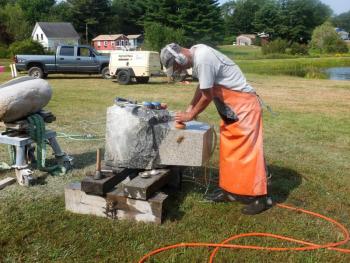 Mark Herrington of Franklin buffs up his sculpture. LISA KRISTOFF/Boothbay Register Mark Herrington, Franklin, ME