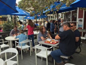 Diners on one of Red’s Eats’ decks. SUZI THAYER/Boothbay Register
