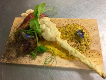 Stephen Richards wowed the people with this smoked lobster mascarpone stuffed tempura zucchini blossom. Courtesy of Michelle Amero