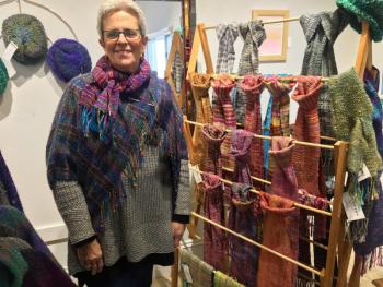 Jill Butke with some of her creations at the Studio 53 Gifts for Giving show on Nov. 18. SUZI THAYER/Boothbay Register