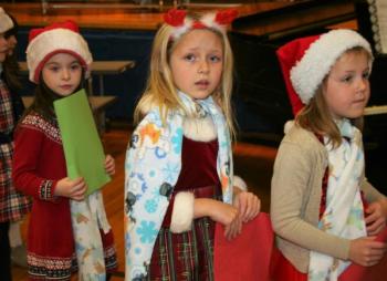 Three darling Christmas sprites await their moment with Old St. Nick. LISA KRISTOFF/Boothbay Register