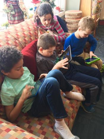 Malachai Donaldson, left, Aubrey Hardwick, Lexi Hughes and Colby Doucette play Minecraft at Boothbay Harbor Memorial Library Jan.10. SUZI THAYER/Boothbay Register