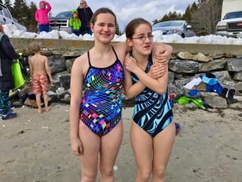 The Giles sisters, Valerie and Grace, at the Leprechaun Leap at Hendricks Head Beach on Southport Island. SUZI THAYER/Boothbay Register