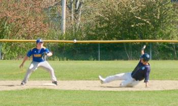 Colby Babcock attempts to throw out a runner. ART MAYERS/Boothbay Register
