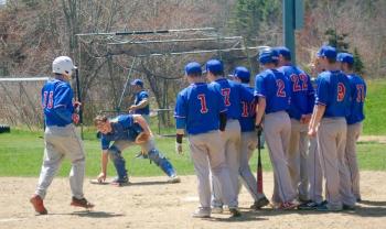Raider Reid Cote is greeted by teammates after a home run. ART MAYERS/Boothbay Register