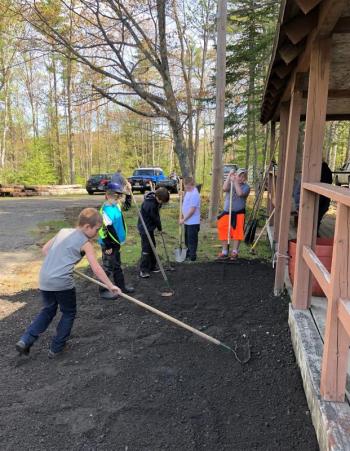 Kolton McKenney, forefront, Nathan Percival, Jeffrey McKinney, Griffin Smith and Ethan Smith working on their community service hours at the Fish and Game Club in Boothbay. Courtesy of Robin Ford
