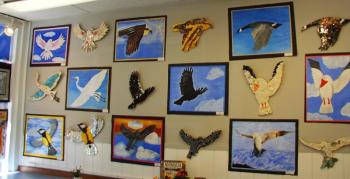 Mosaic birds and paintings wall. BRHS students