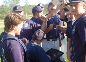 Dirigo team members listen to McPhee. ART MAYERS/Boothbay Register