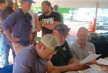 Judges confer as finalists look on. ART MAYERS/Boothbay Register