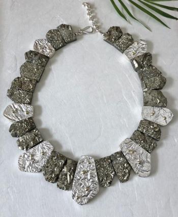 Christine Peters’ reticulated collar necklace in silver, gold and pyrite. Courtesy of Christine Peters Christine Peters Jewelry