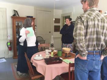 Volunteer Shelby Kaider leads visitors through a tour of the Hendricks Hill Museum. ISABELLE CURTIS/Boothbay Register