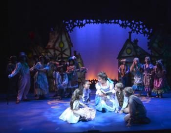Sophia Scott of Boothbay sits to Belle’s left in a scene from Maine State Music Theater’s production of Disney’s “Beauty and the Beast.” Courtesy of Carol Hammond Maine State Music Theater