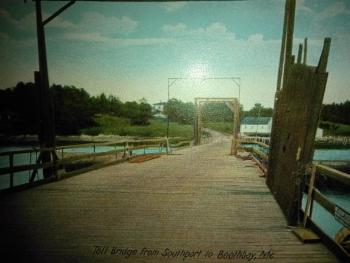 The old Southport toll bridge, 1921. The Lewis home can be seen just to the right of the wooden bridge. Courtesy Duane and Dwight Lewis.