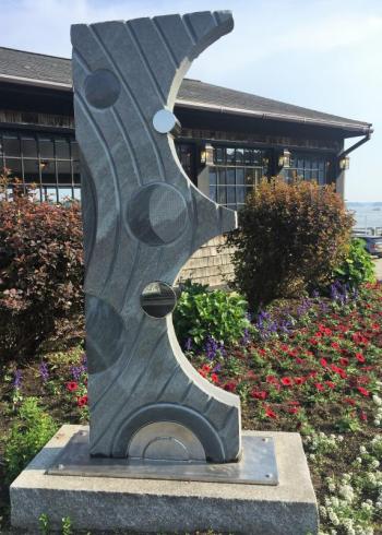 “Galaxy” sculpture of Norum Bega granite, Bill Royall, at Tugboat Inn, Commercial Street. William “Bill” Royall, Southport ME