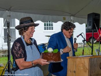 Wendy Ross Eichler displays a “Two in One Dessert,” that sold for a record-breaking $1,000 through the deft efforts of auctioneer Kaja Veilleux of Thomaston Place Auction Galleries. Bob Bond photo