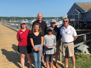 Hometown sailors qualify for national championships. Pictured from left are, front row, sailors Ella Beauregard and Hamilton Barclay; back row: BHYC Officers Liz Rettenmier, Gardiner Rapaleye, Lee Krow and Rob Wheeler. Courtesy of Charles Barclay