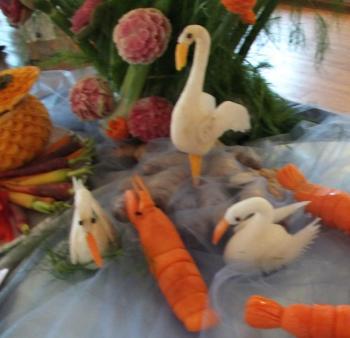 Snowy egrets and lobsters along the coastline of one of Somjit Lim’s outstanding food sculptures.