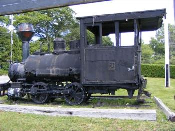 S.D. Warren Baldwin No. 2 sat under the Museum’s entrance sign on Route 27 from 1969 to 2008. Volunteers and staff who pulled the engine into the workshop nearly a decade ago often remark that she was more black paint and duct tape by the time the restoration began. Courtesy of BRV
