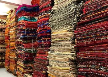 A carpet shop in Essaouira, Morocco that Diana Kerr and Kathleen Jones buy from. Courtesy of Kathleen Jones