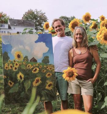 Brad and Danielle Betts in the field at Down East Gallery. Courtesy photo