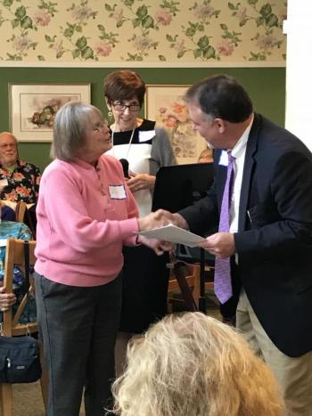 Judy Boyes presents a donation to Scott Shott with Irene Gerney. KELLIE BIGOS/Boothbay Register