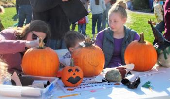 A family of pumpkin decorators! LISA KRISTOFF/Boothbay Register The Great Pumpkin Hunt at Coastal Maine Botanical Gardens Oct. 20.