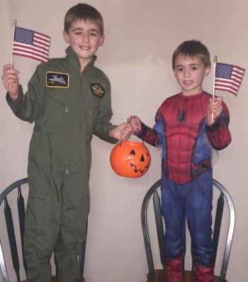 Trick-or-treaters Avery Fowlie, 8, left, and his brother, Kameron Fowlie, 6, donated a portion of their Halloween collection to a local project sending active duty Boothbay region soldiers candy. Courtesy photo