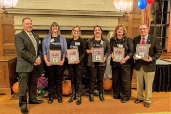 United Way Campaign Chair Joel Merry, left, with the “Loaned Executive” team that worked full time on the Campaign. From left, Lisa Fogg of L.L. Bean, Gina Vickers, Sherri Emery, Cindy Heil of Southport, and John Portela of Local S6 and BIW. Courtesy photo
