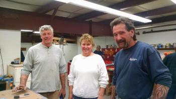 Hodgdon Yacht Services Human Resources Manager Diane Hammond, center, with woodworkers Jim Jones, left, and Dave Radtke at a recent work session. MARGARET HOFFMAN/Boothbay Register
