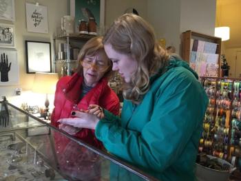 Melanie Mohney, left, of Gardiner and daughter Emma look at a piece of jewelry at Rock Paper Scissors. SUSAN JOHNS/Wiscasset Newspaper