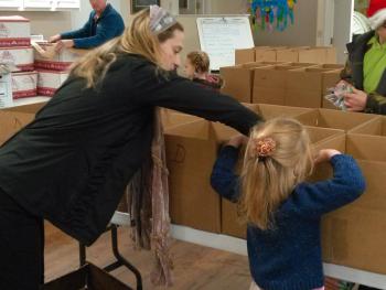 Never too young to learn how to volunteer. JANE CARPENTER/Boothbay Register