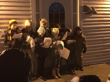 Southport Central School carolers, front from left:: Georgia Griffith and Stella Stevens; back row, from left: Sage Wickline, Pippa Schoenthal, Cameron Payson, Alex Heil (partially hidden), Liam Scott and Grady Gamage. KELLIE BIGOS/Boothbay Register