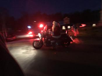Santa bursts through the fog. KELLIE BIGOS/Boothbay Register
