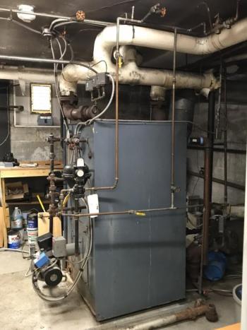 Boiler of the old steam system. KELLIE BIGOS/Boothbay Register