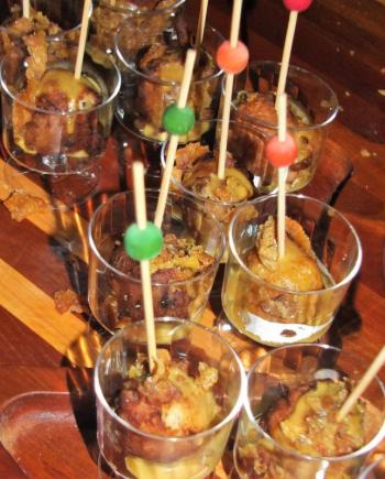 Roasted chicken and corn fritters with an island curry drizzle and poultry skin crackins by Chef Michael Whitney. LISA KRISTOFF/Boothbay Register