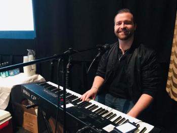 Max Ater entertained the audience for the first hour of the event playing keyboards and guitar. Cherie Scott photo