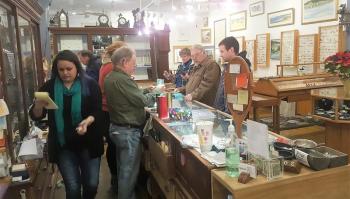 Tony Heyl and his crew keep busy helping shoppers at A Silver Lining during Men’s Night. STEVE EDWARDS/Boothbay Register